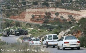 Checkpoint in Bil'in (image by Mohammad Yassin)