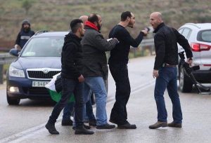 Israeli settler militia member confronting protesters in Nabi Saleh