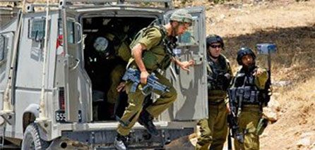 Israeli soldiers in al-Eesawiyya (image from info-palestine.org)