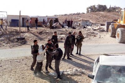 Israeli troops stop Palestinian man at checkpoint (PCHR photo)