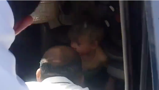 Israeli settler child being rescued by Palestinians