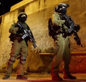 Israeli soldiers engaging in night raid (archive image)