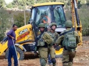 Soldiers confiscate A Palestinian Bulldozer Near Jenin