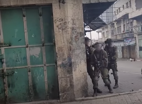 Israeli troops invade Hebron March 18, 2022 (image from video by Wafa News Agency)