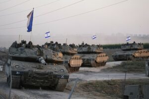 Gaza Death Toll Passes 1500 as Israeli Tanks Line Up on Border