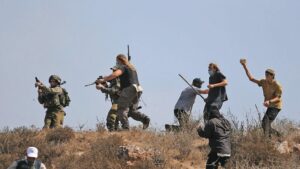 Israeli Colonizers Injure Two Palestinians in the West Bank