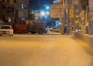 Soldiers Shoot A Palestinian, Abduct Father And son, In Qalandia