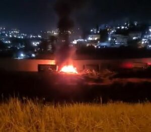 Israeli Colonizers Attack Aid Trucks, Burn One, Near Hebron