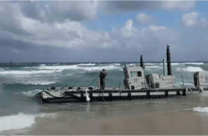 Part of an American-built pier off the coast of Gaza that broke off recently and washed up on the Israeli coast of Ashdod