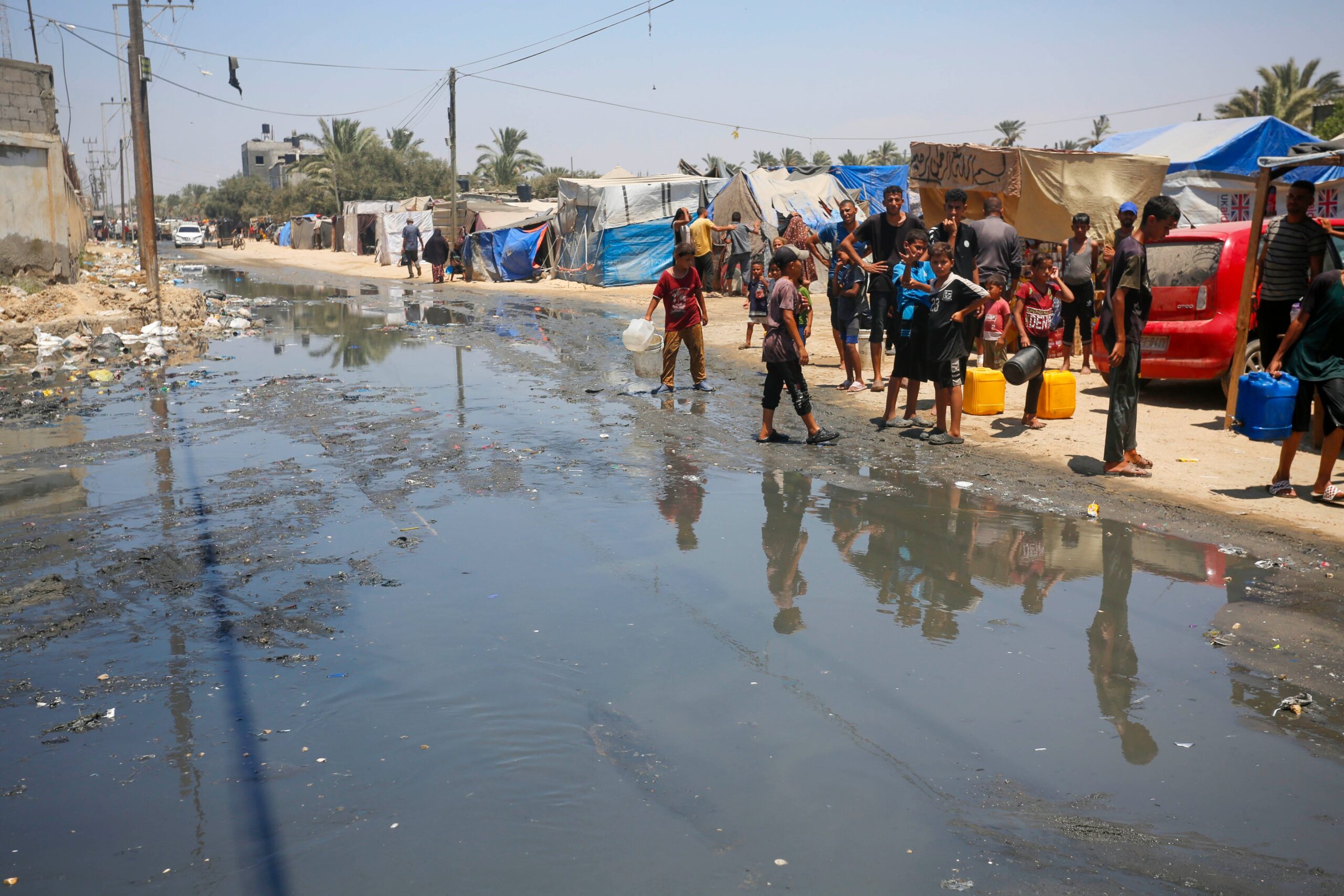 UNRWA photo: children seeking water in Gaza