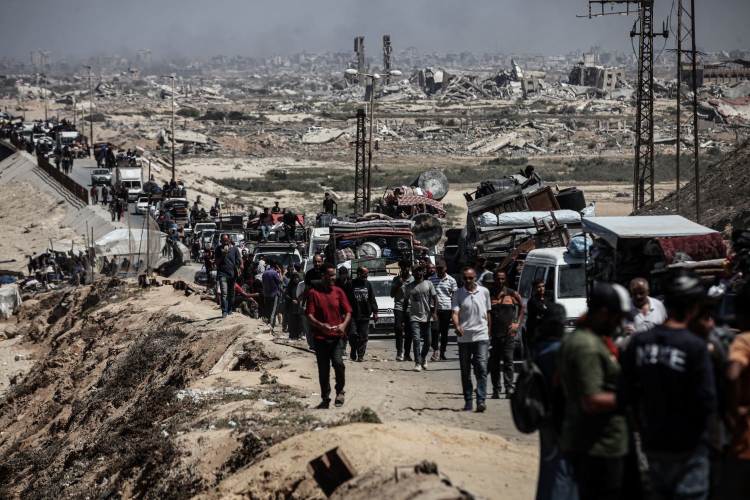 Palestinian residents fleeing Gaza City in search of a safe place to shelter: